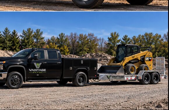 Vantage pickup hauling a skid steer on a trailer